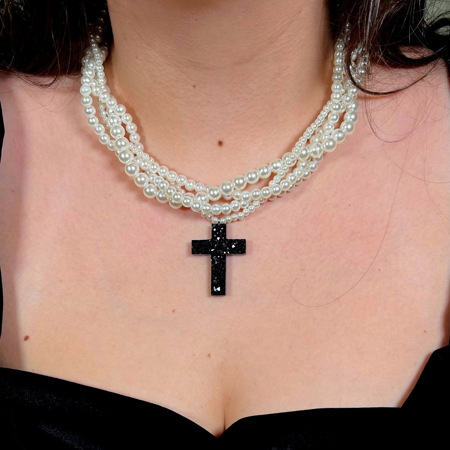 Braided pearl necklace with large-crystal cross pendant