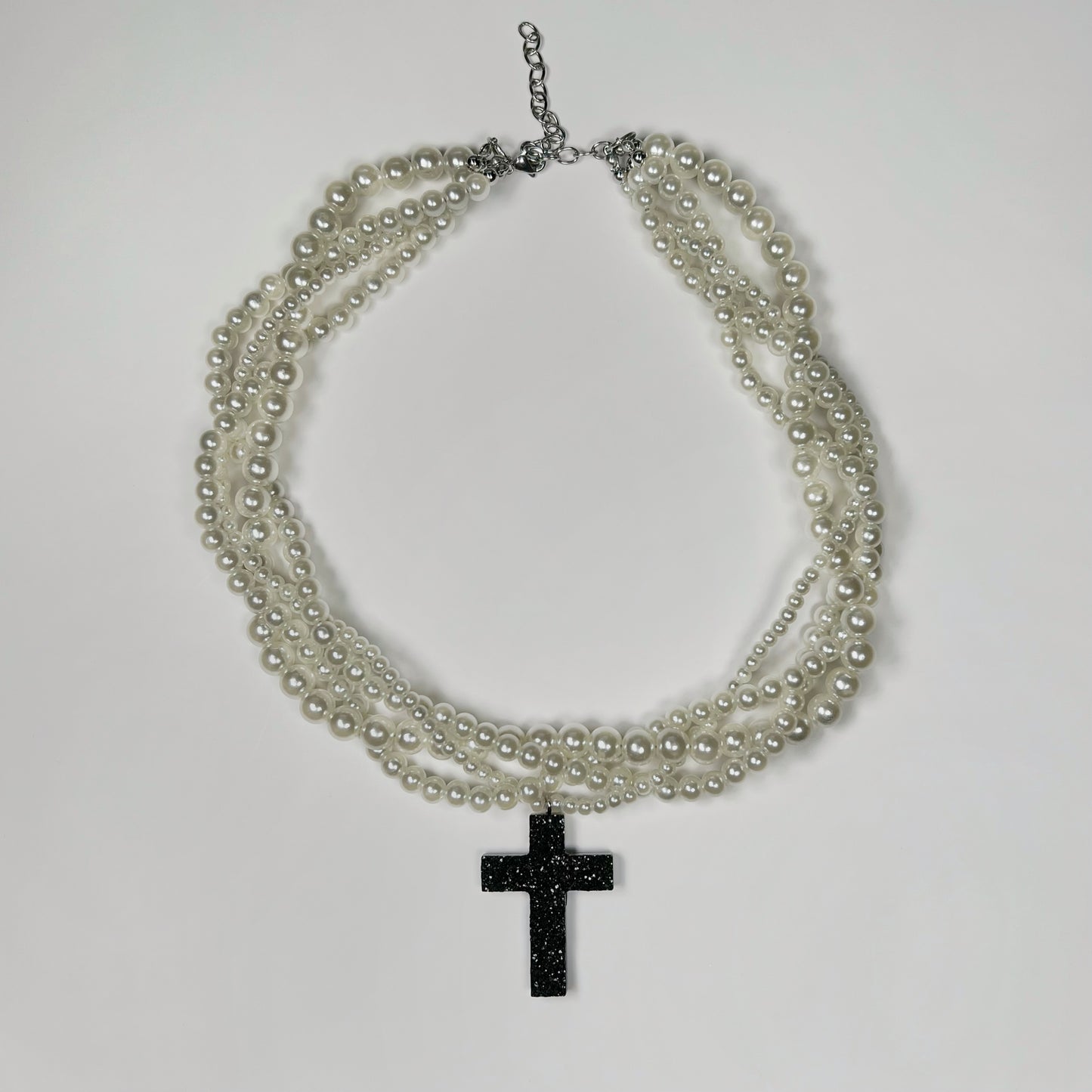 Braided pearl necklace with tiny-crystal cross pendant